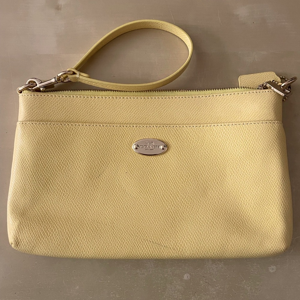 Coach Wristlet in light yellow
